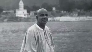 Swami Sivananda beside the sacred Ganges river