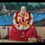 Bhakti guru adorned with flower garlands inspiring devoted seekers peacefully together