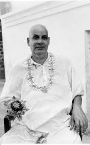 Mind is Not Atman 54 Swami Sivananda seated wearing flower garland picture