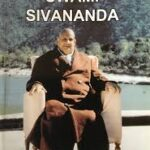 Swami Sivananda seated outdoors in peaceful surroundings portrait