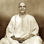 Goswami Tulsidas seated in peaceful meditation pose