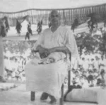 Swami Sivananda addressing devotees with compassion