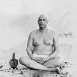 Swami Sivananda meditating in peaceful solitude