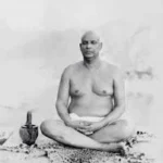 Swami Sivananda meditating in peaceful solitude