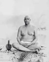Swami Sivananda meditating in peaceful solitude