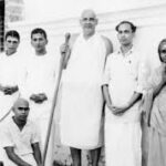 Jivanmukti and Videhamukti spiritual teachers standing with devoted disciples together