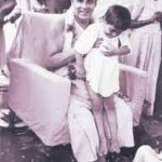 Swami Sivananda blessing young child
