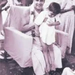 Swami Sivananda blessing young child