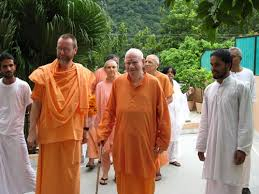 Spiritual master walking with devoted disciples in harmony