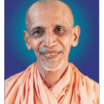 Renunciate monk smiling peacefully embodying spiritual sacrifice and wisdom