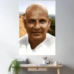 Swami Sivananda portrait displayed on a wall