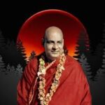 Swami Sivananda wearing garland symbolizing self-surrender