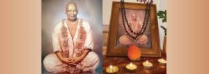 Swami Sivananda portrait with framed devotional photograph