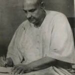Meditating spiritual master writing sacred teachings image