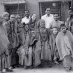 Swami Sivananda with devotees conquering mind's strongholds