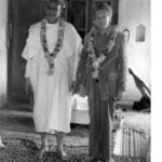 Swami Sivananda with disciple inspiring self-conquest