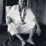 Swami Sivananda seated peacefully teaching mastery over mind
