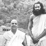 Swami Sivananda with Swami Krishnananda by the Ganges