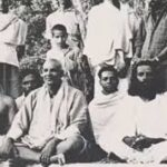 Swami Sivananda with devotees demonstrating self-control