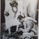 Swami Sivananda blessing devoted disciple with compassion