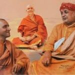 Sri Swami Sivananda discussing the philosophy of Bhakti with disciples