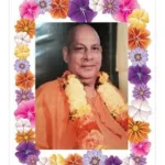 Swami Sivananda portrait with floral frame symbolizing divine love