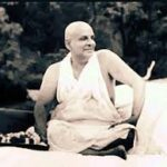 Swami Sivananda seated during Samyama meditation outdoors