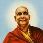 Swami Sivananda portrait with radiant spiritual aura