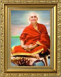 Swami Sivananda Framed portrait of meditating spiritual guru photo