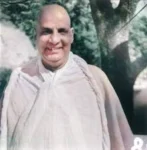 Smiling Swami Sivananda outdoors inspiring spiritual seekers