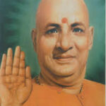 Swami Sivananda offering blessings with raised hand