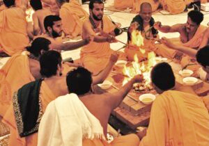 Hindu priests performing sacred Vedic yajna fire ritual