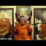 Sravana spiritual teacher delivering inspiring discourse before revered guru portraits together