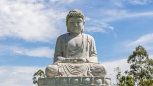 Large Buddha statue in peaceful meditation outdoors