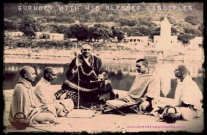 Gurudev teaching devoted disciples beside peaceful riverside