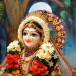 Sri Radha adorned with flowers and divine ornaments radiating devotion