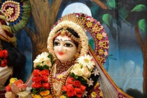 Sri Radha adorned with flowers and divine ornaments radiating devotion