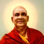 Swami Sivananda portrait with glowing halo background.