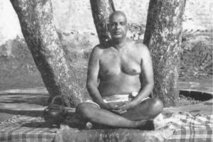 Swami Sivananda meditating beneath sacred trees