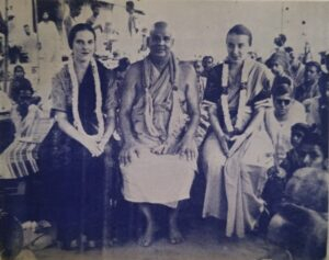Swami Sivananda with devotees and disciples at a spiritual gathering