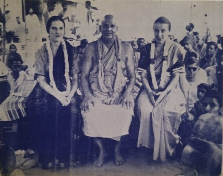 Swami Sivananda with devotees and disciples at a spiritual gathering