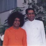 Sri Sathya Sai Baba with Prof. Anil Kumar smiling together