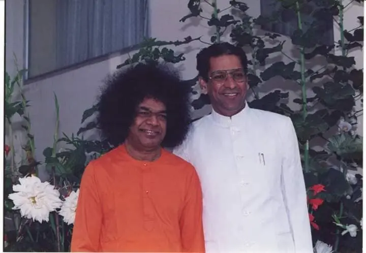 Sri Sathya Sai Baba with Prof. Anil Kumar smiling together