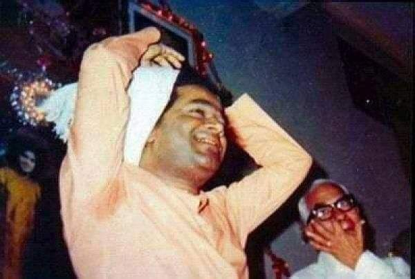 Young Sri Sathya Sai Baba joyfully smiling during playful divine moment
