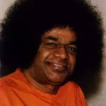 Sri Sathya Sai Baba smiling with divine love and compassion