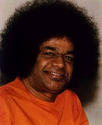 Sri Sathya Sai Baba smiling with divine love and compassion
