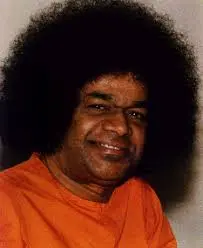 Sri Sathya Sai Baba smiling with divine love and compassion