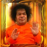 Bhagawan Sri Sathya Sai Baba blessing devotees with raised hands