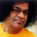 Sri Sathya Sai Baba radiating divine wisdom with compassionate gaze
