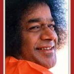 Sri Sathya Sai Baba smiling with radiant divine love always